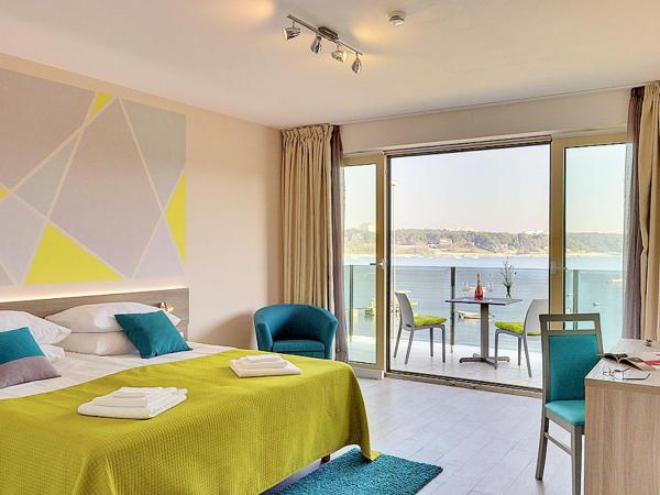 Hotel Modo : photo 1 de la chambre chambre double deluxe avec balcon - vue sur mer