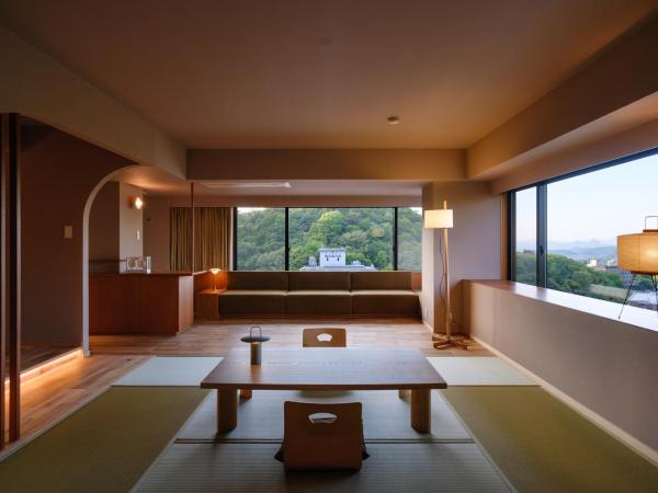 Negiya Ryofukaku : photo 1 de la chambre chambre lits jumeaux d'angle deluxe avec coin tatami - vue sur montagnes - tour est - non-fumeurs