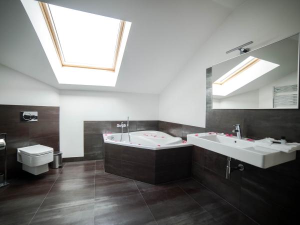 Hotel Herrmes : photo 6 de la chambre chambre quadruple deluxe