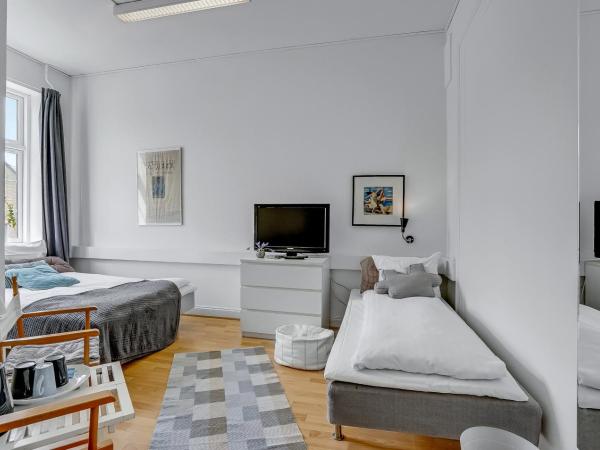 Villa Gertrud : photo 2 de la chambre chambre triple avec salle de bains