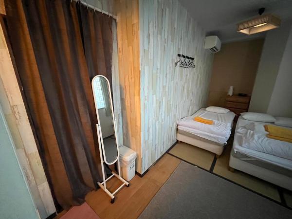 Shinjuku Sky hostel : photo 2 de la chambre chambre triple Économique