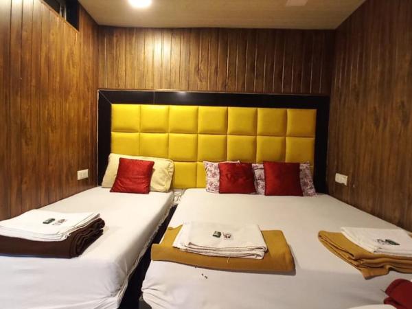 Hotel Janata : photo 8 de la chambre chambre deluxe avec 2 lits queen-size