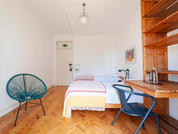 Cheese & Wine Lapa : photo 7 de la chambre chambre lits jumeaux avec salle de bains commune - vue sur jardin