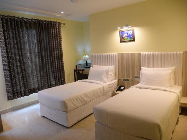 Broadway Inn : photo 1 de la chambre chambre lits jumeaux standard