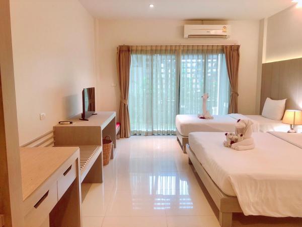 Phuketa - SHA Extra Plus : photo 1 de la chambre chambre double ou lits jumeaux deluxe - vue sur ville