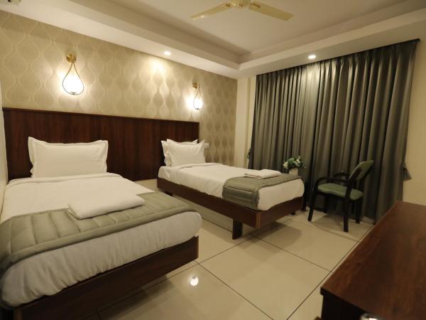 Earth Hotels : photo 10 de la chambre chambre lits jumeaux avec salle de bains