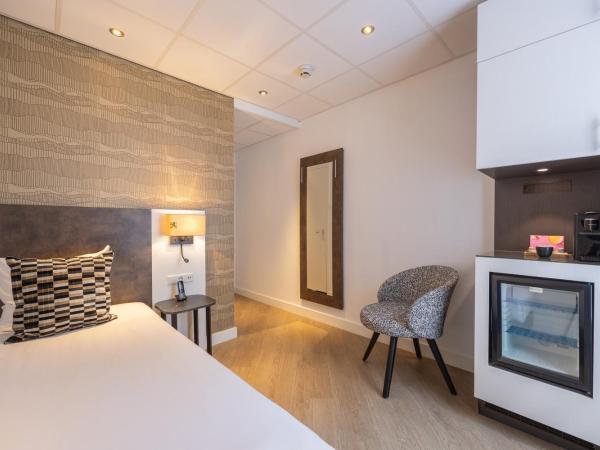 Hotel Amsterdam De Roode Leeuw : photo 1 de la chambre chambre simple