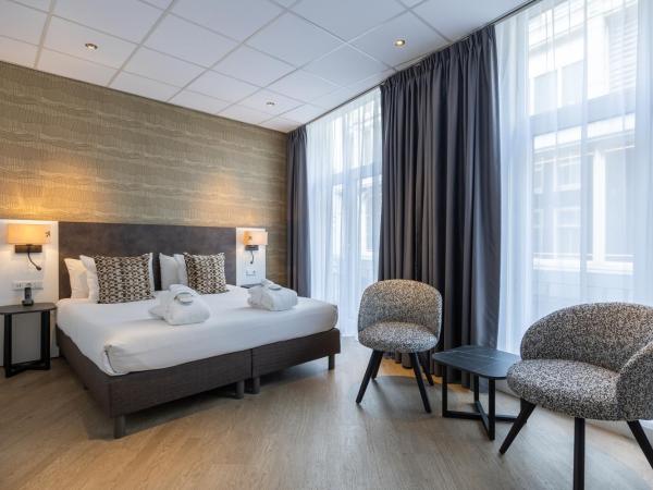 Hotel Amsterdam De Roode Leeuw : photo 1 de la chambre chambre double ou lits jumeaux supérieure