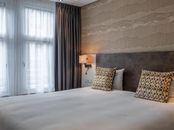 Hotel Amsterdam De Roode Leeuw : photo 3 de la chambre chambre confort double ou lits jumeaux avec vue sur la ville