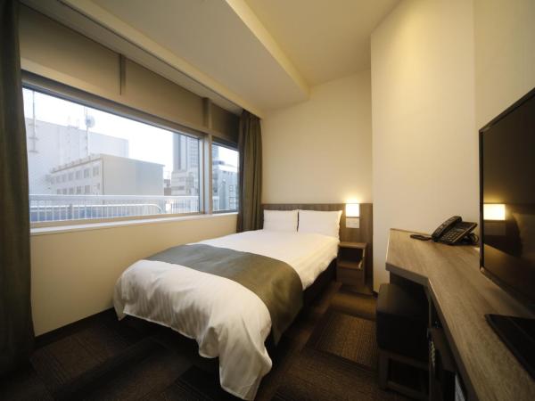 Dormy Inn Korakuen : photo 6 de la chambre chambre double avec petit lit double