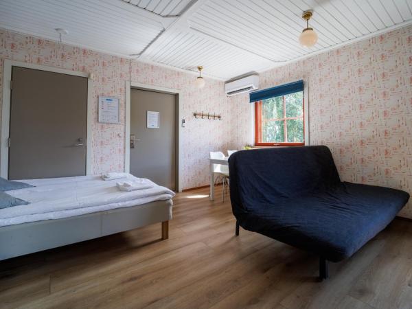 Hotelli Uninen Tampere : photo 3 de la chambre suite avec sauna