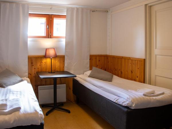 Hotelli Uninen Tampere : photo 6 de la chambre chambre lits jumeaux supérieure avec sauna