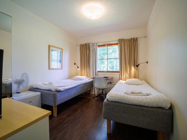 Hotelli Uninen Tampere : photo 3 de la chambre chambre lits jumeaux