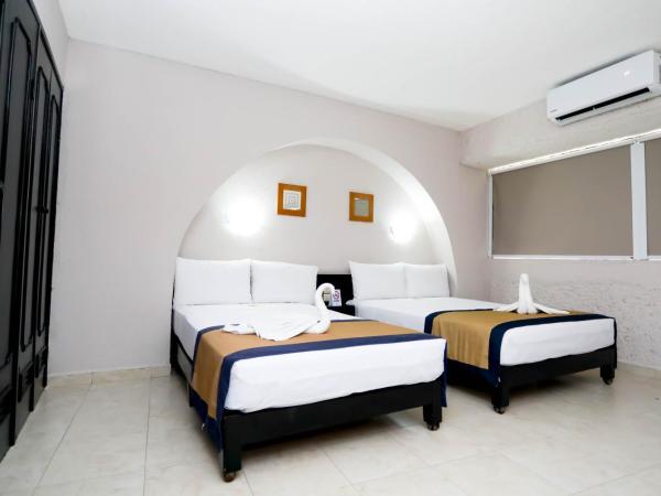 Hotel Caribe Internacional Cancun : photo 7 de la chambre chambre lits jumeaux supérieure