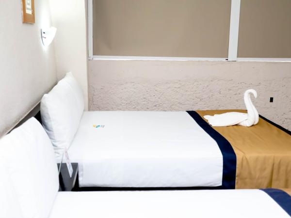 Hotel Caribe Internacional Cancun : photo 5 de la chambre chambre lits jumeaux supérieure