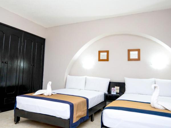 Hotel Caribe Internacional Cancun : photo 8 de la chambre chambre lits jumeaux supérieure