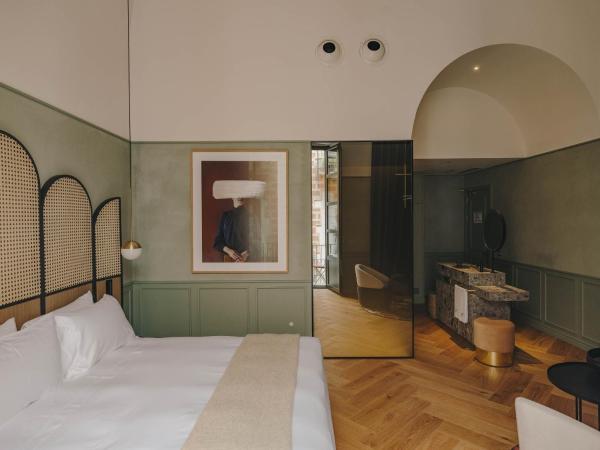 Hotel Palau Fugit : photo 4 de la chambre chambre double ou lits jumeaux deluxe - vue sur ville 
