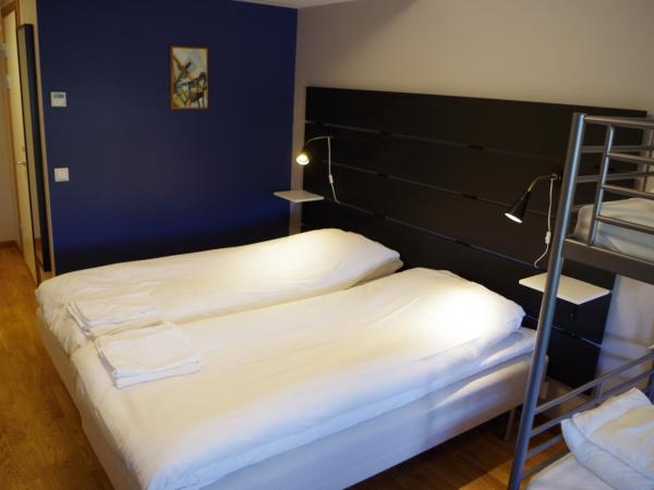 Spoton Hostel & Sportsbar : photo 7 de la chambre chambre quadruple deluxe