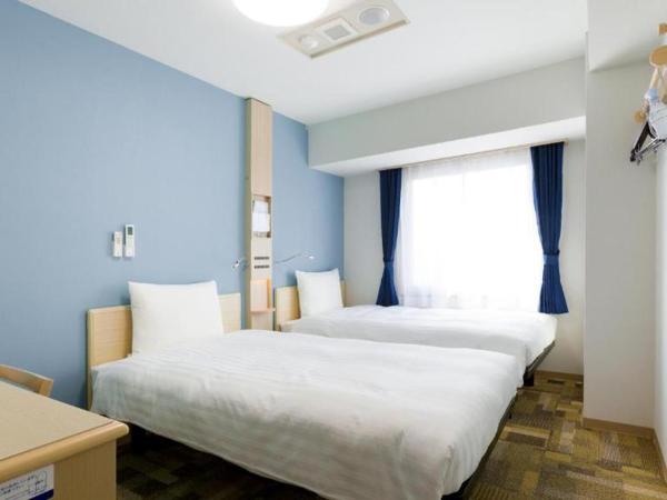 Toyoko Inn Nagoya-eki Sakuradori-guchi Shinkan : photo 1 de la chambre chambre lits jumeaux - non-fumeurs