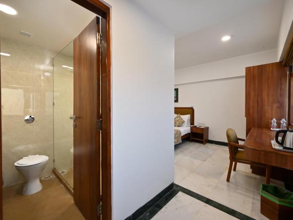 Hotel Parle International : photo 1 de la chambre chambre deluxe double ou lits jumeaux