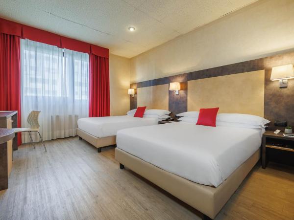 JR Hotels Bologna Amadeus : photo 1 de la chambre chambre deluxe avec 2 lits doubles