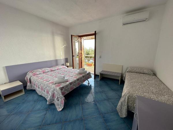 Villa Paradise : photo 1 de la chambre chambre double deluxe avec balcon - vue sur mer