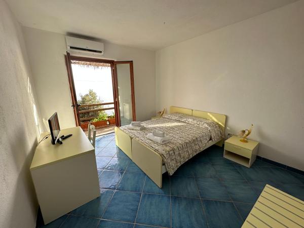 Villa Paradise : photo 1 de la chambre chambre double deluxe avec balcon - vue sur mer