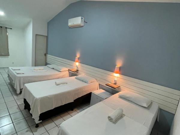 Pousada Encanto dos Mares : photo 3 de la chambre chambre quadruple