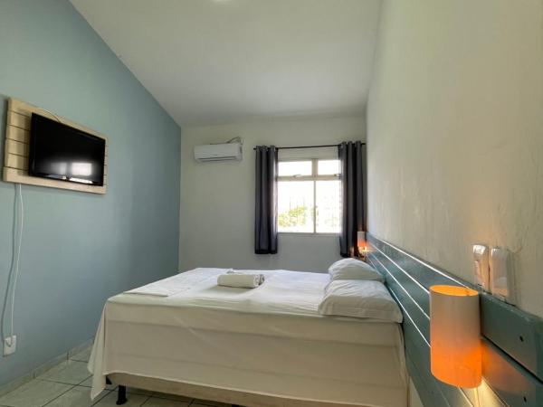 Pousada Encanto dos Mares : photo 4 de la chambre suite