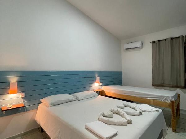 Pousada Encanto dos Mares : photo 5 de la chambre chambre triple supérieure