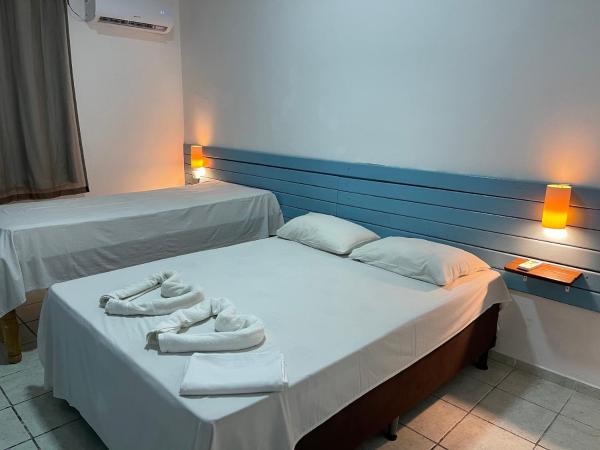 Pousada Encanto dos Mares : photo 8 de la chambre chambre triple supérieure