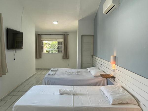 Pousada Encanto dos Mares : photo 4 de la chambre chambre quadruple