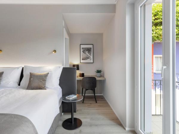 Living Ascona Boutique Hotel - Smart Access : photo 1 de la chambre chambre double basique avec balcon