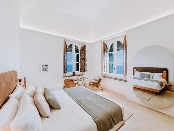 Faro Punta Imperatore : photo 1 de la chambre chambre double deluxe - vue sur mer