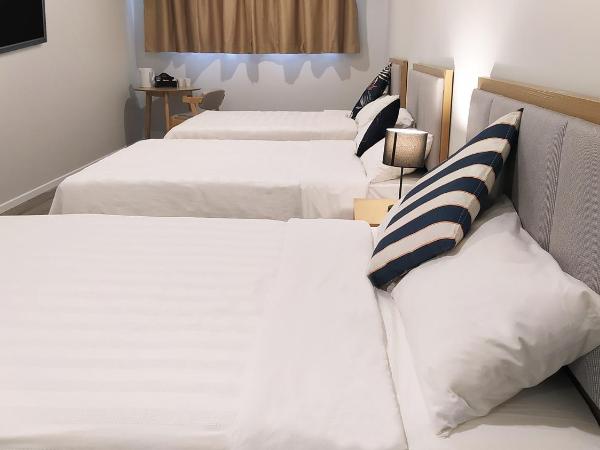 AWA Hotel : photo 3 de la chambre chambre triple supérieure