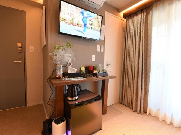 Hotel Tokyo Hub : photo 6 de la chambre chambre quadruple avec balcon