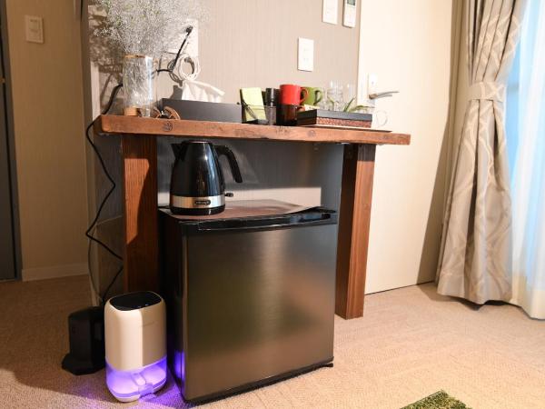 Hotel Tokyo Hub : photo 5 de la chambre chambre quadruple avec balcon