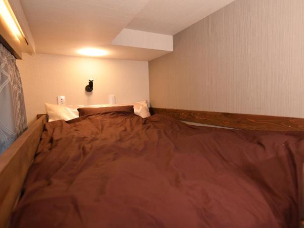 Hotel Tokyo Hub : photo 4 de la chambre chambre quadruple avec balcon