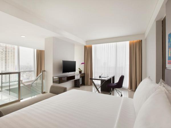 Hotel Santika Premiere Hayam Wuruk Jakarta : photo 1 de la chambre suite lit king-size