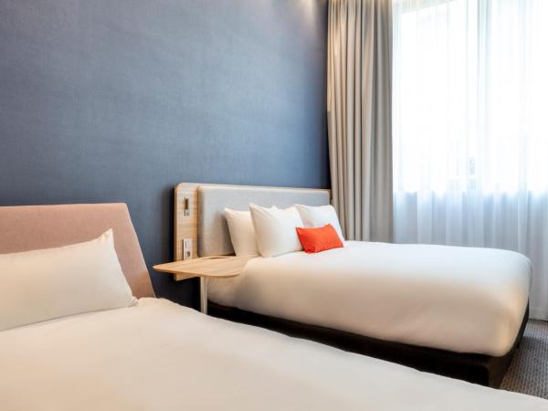 Holiday Inn Express Antwerp - City Centre, an IHG Hotel : photo 1 de la chambre chambre lits jumeaux standard avec canapé-lit