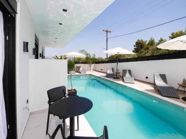 Solvio Boutique Hotel & Spa : photo 1 de la chambre chambre lit king-size - vue sur piscine 
