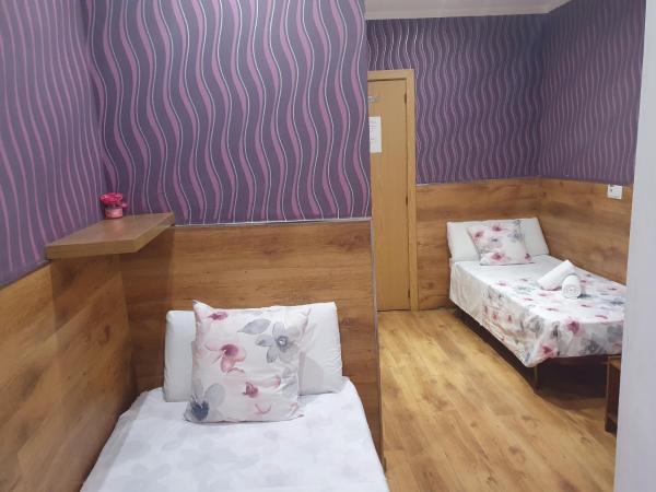 Hostal Abel Victoriano : photo 4 de la chambre chambre lits jumeaux Économique