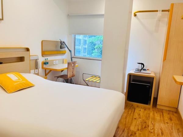 bloomrooms @ City Centre : photo 3 de la chambre chambre exécutive lit queen-size