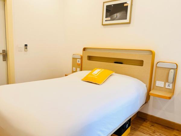 bloomrooms @ City Centre : photo 4 de la chambre chambre exécutive lit queen-size