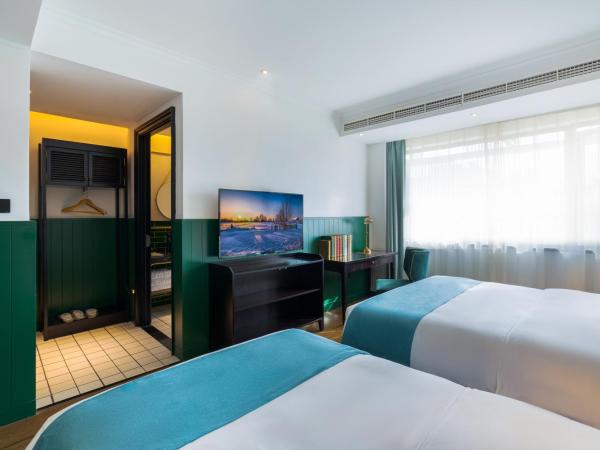 Hangzhou Lanshe hotel : photo 2 de la chambre chambre triple deluxe