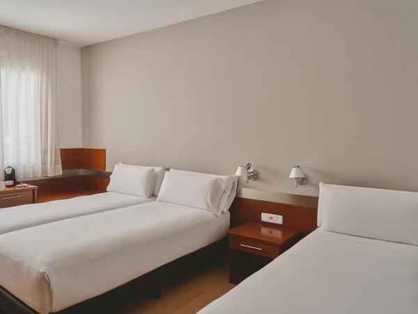 Tres Torres Atiram Hotels : photo 1 de la chambre chambre triple