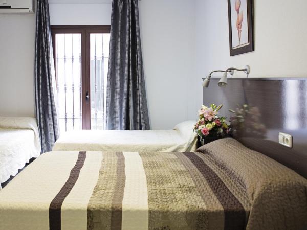 La Casa de los Faroles : photo 1 de la chambre chambre quadruple avec salle de bains privative