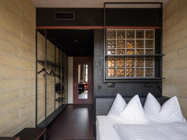 Tailormade Hotel LEO St Gallen : photo 2 de la chambre cosy queen (13qm)