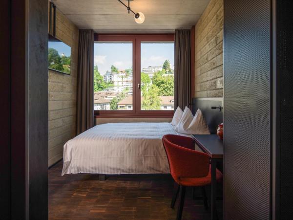 Tailormade Hotel LEO St Gallen : photo 3 de la chambre cosy queen (13qm)