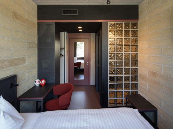 Tailormade Hotel LEO St Gallen : photo 4 de la chambre cosy queen (13qm)